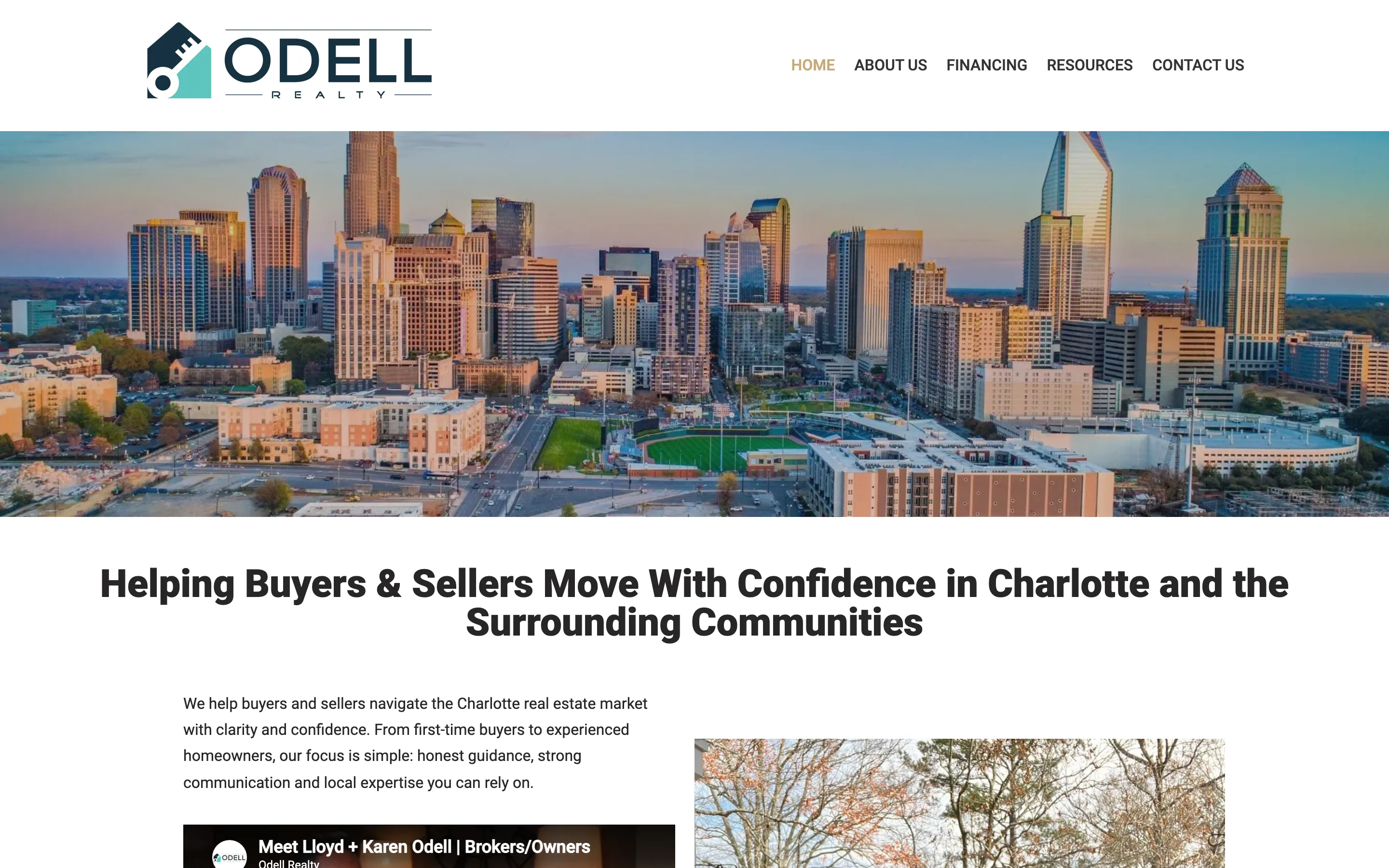 The previous Odell Realty home page: a page-builder template with a stock aerial photograph of the Charlotte skyline and a bold sans-serif headline.